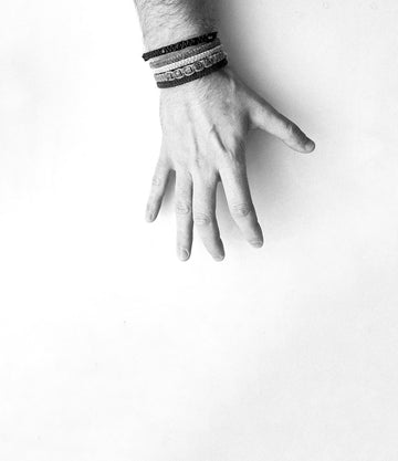 person wearing bracelets